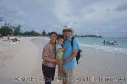 Darwin and mommy and daddy at Carlisle Bay Beach in Bridgetown Barbados.jpg
