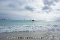 Numerous boats in the waters off of Carlisle Bay Beach in Bridgetown Barbados.jpg