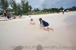 Kids playing at Carlisle Bay Beach in Bridgetown Barbados.jpg