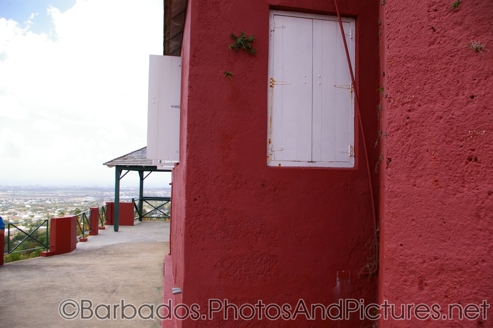 Red stucco and white shutter of Gun Hill Signal Station in Barbados.jpg
