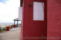 Red stucco and white shutter of Gun Hill Signal Station in Barbados.jpg