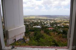 Looking out through a window at the Gun Hill Signal Station tower in Barbados.jpg