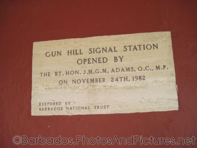 Plaque that says Gun Hill Signal Station Opened by The RT Hon JMGM Adams QC MP on November 24th 1982 Restored by Barbados Nation
