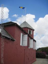 Red building with white shutters at Gun Hill Signal Station in Barbados.jpg