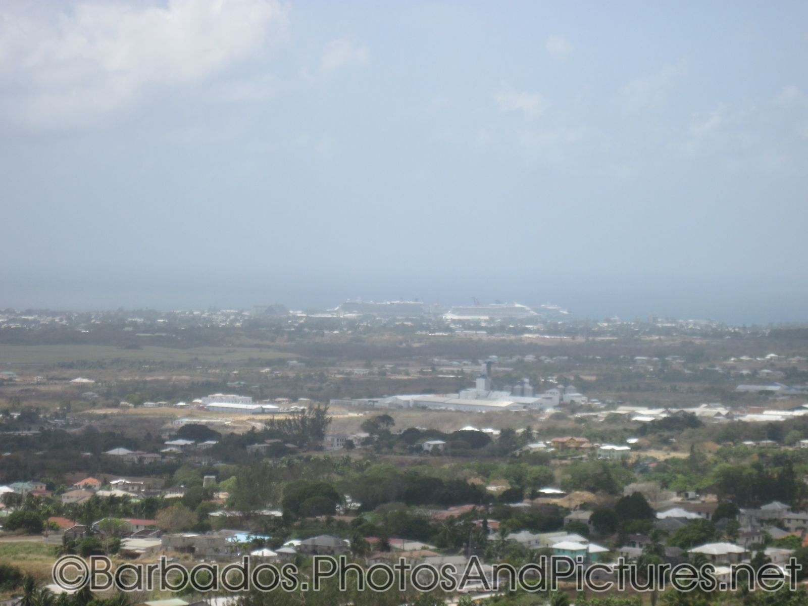 NCL and Carnival cruise ships viewed from Gun Hill Signal Station in Barbados.jpg
