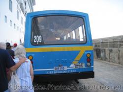Barbados cruise port transport bus at pier for Norwegian Dawn.jpg
