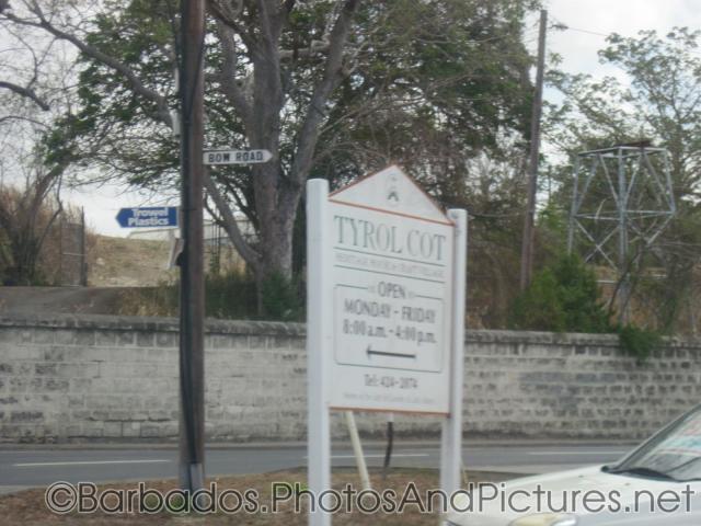 Tyrol Cot sign indicating open and close hours in Barbados.jpg
