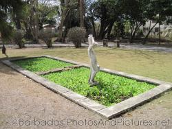 Statue in a garden at Tyrol Cot in Barbados.jpg