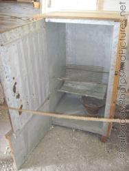 Open oven cabinet of Tyrol Cot in Barbados.jpg