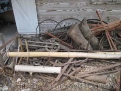 Equipment and tools outside the Blacksmith's Shop of Tyrol Cot in Barbados.jpg