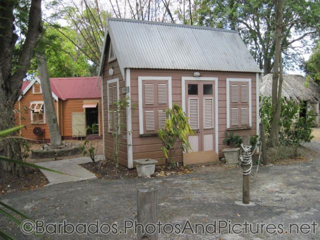 Small salmon color cottage at Tyrol Cot in Barbados.jpg
